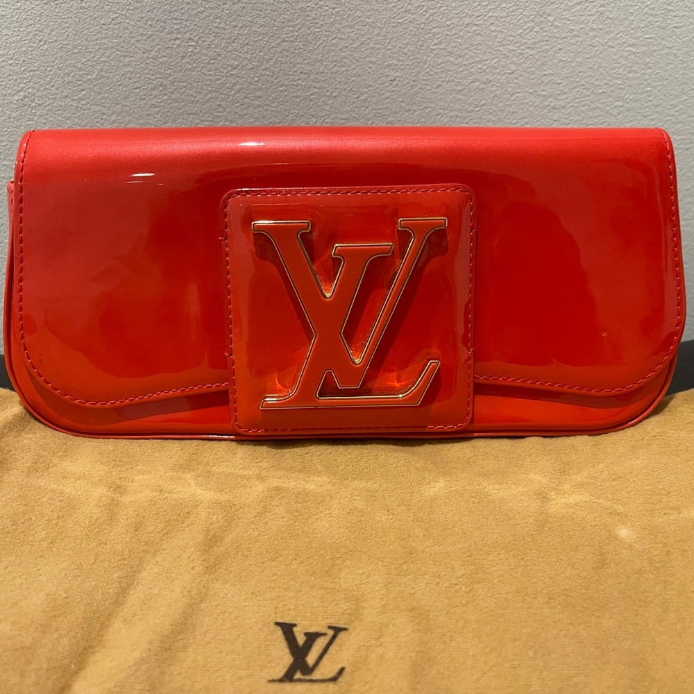 Louis Vuitton Sobe clutch Orange Sunset color